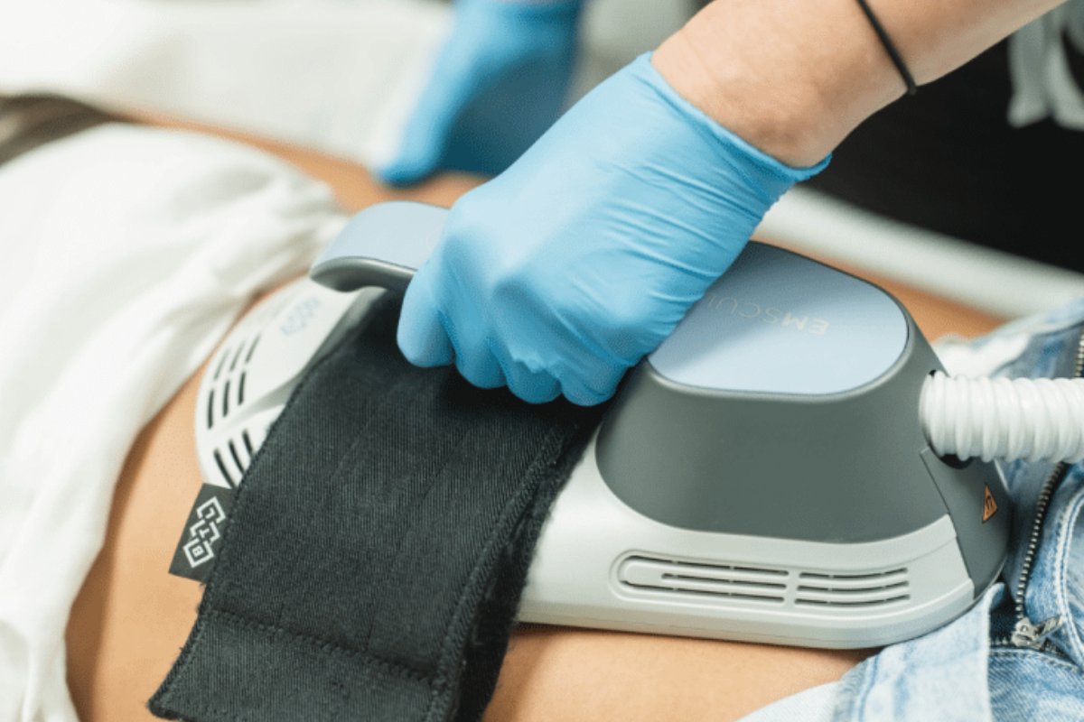 Emsculpt treatment close-up at Belle Âme Med Spa in Oklahoma City using HIFEM technology for muscle toning.