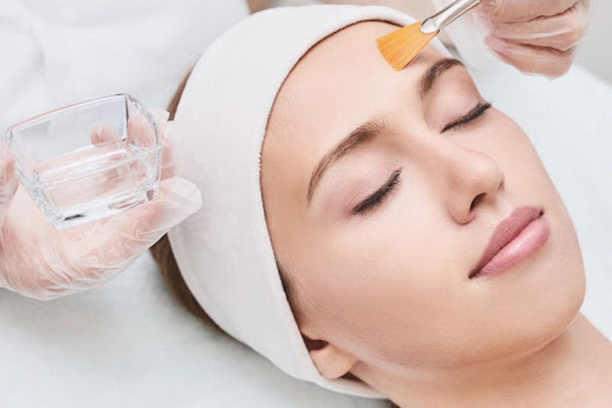 Cleansing the skin before a dermaplane facial to prepare for exfoliation
