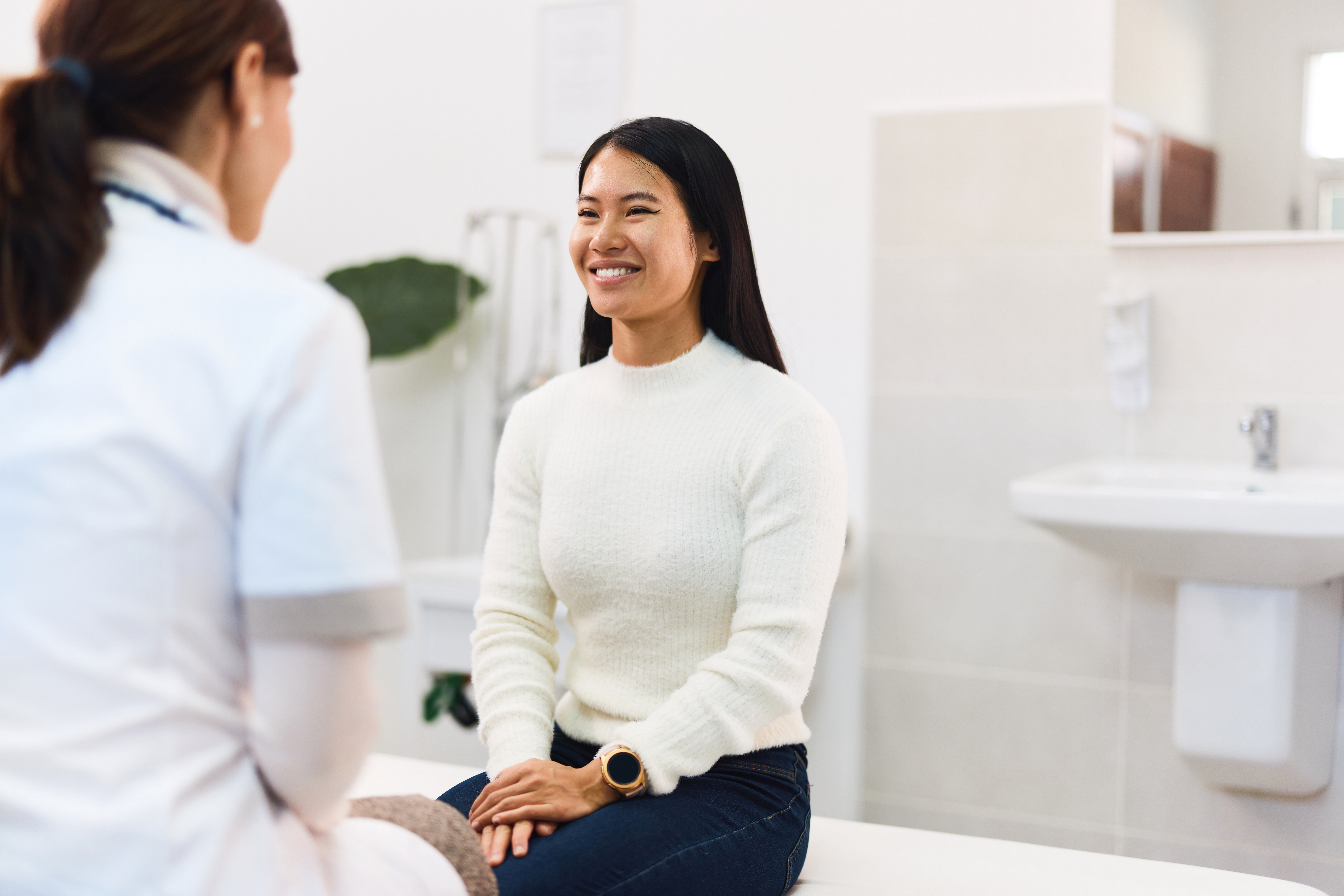 Patient discussing IV therapy, drip hydration, and immunity boost options with a medical provider at Belle Âme Med Spa.