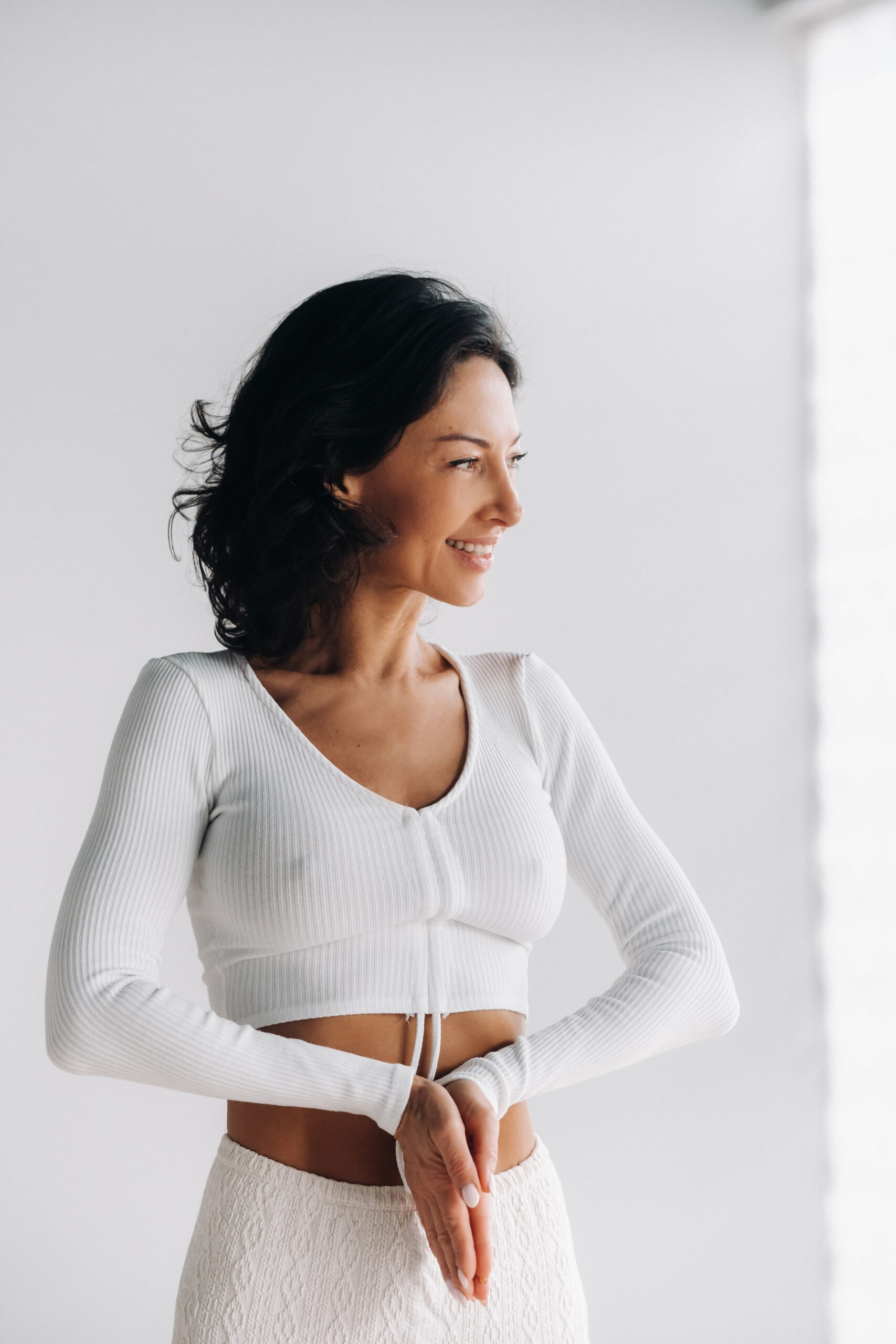 Woman feeling refreshed after IV therapy with drip hydration and immunity boost support at Belle Âme Med Spa.